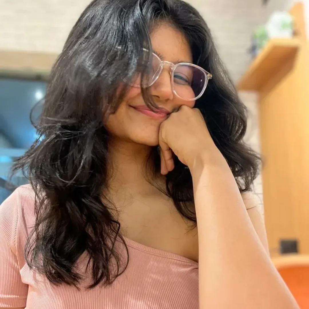 sexy call Girl showing happy expression while messaging